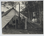 Camp site showing American, Dominion (Canadian) & USGS flags - Click for larger image [89-6346; RU95, Box 69]