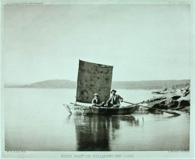 Two men exploring the Yellowstone Lake by boat, as part of the Department of Interior's U.S. Geologi