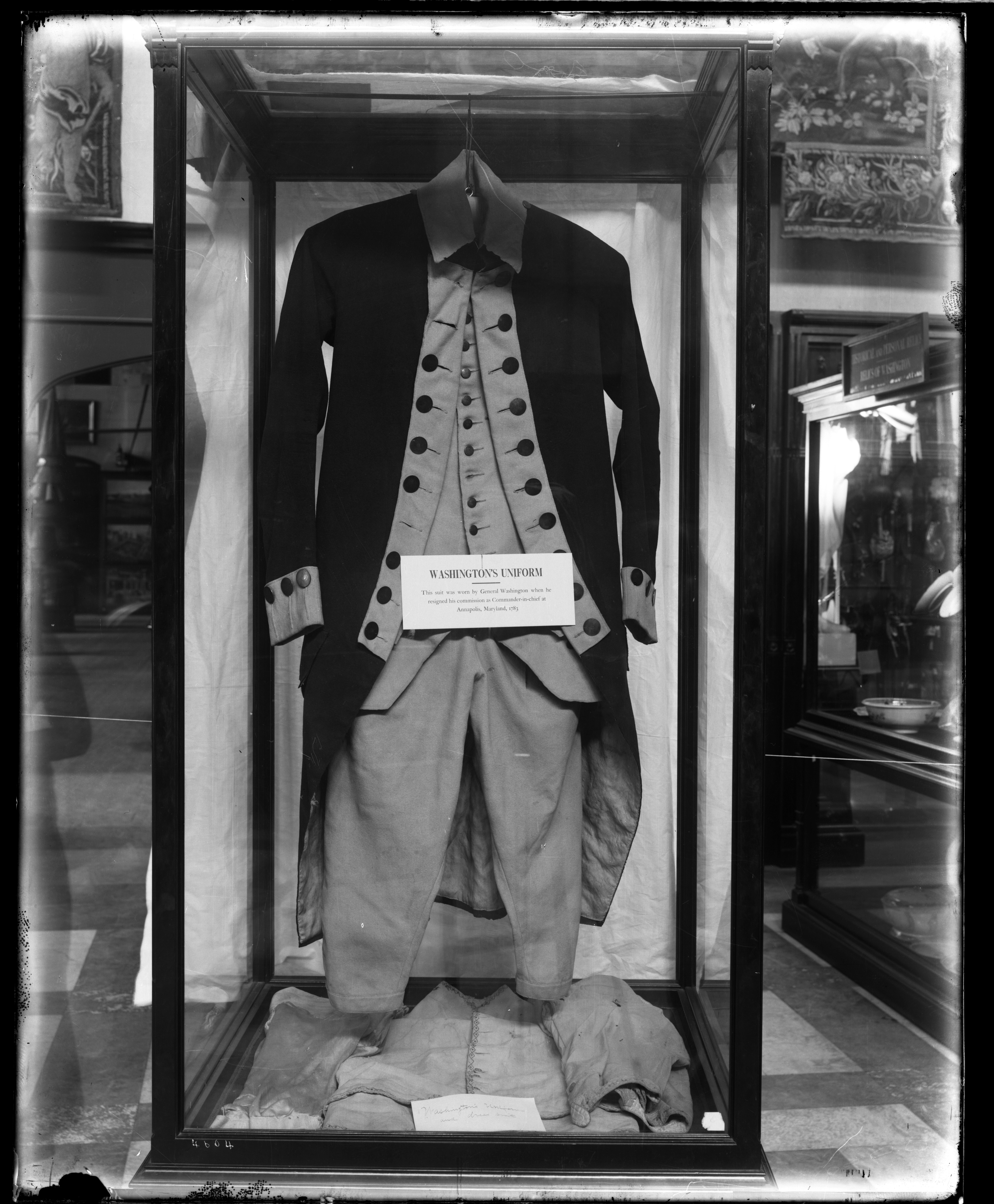George Washington's military uniform in an exhibit case. 