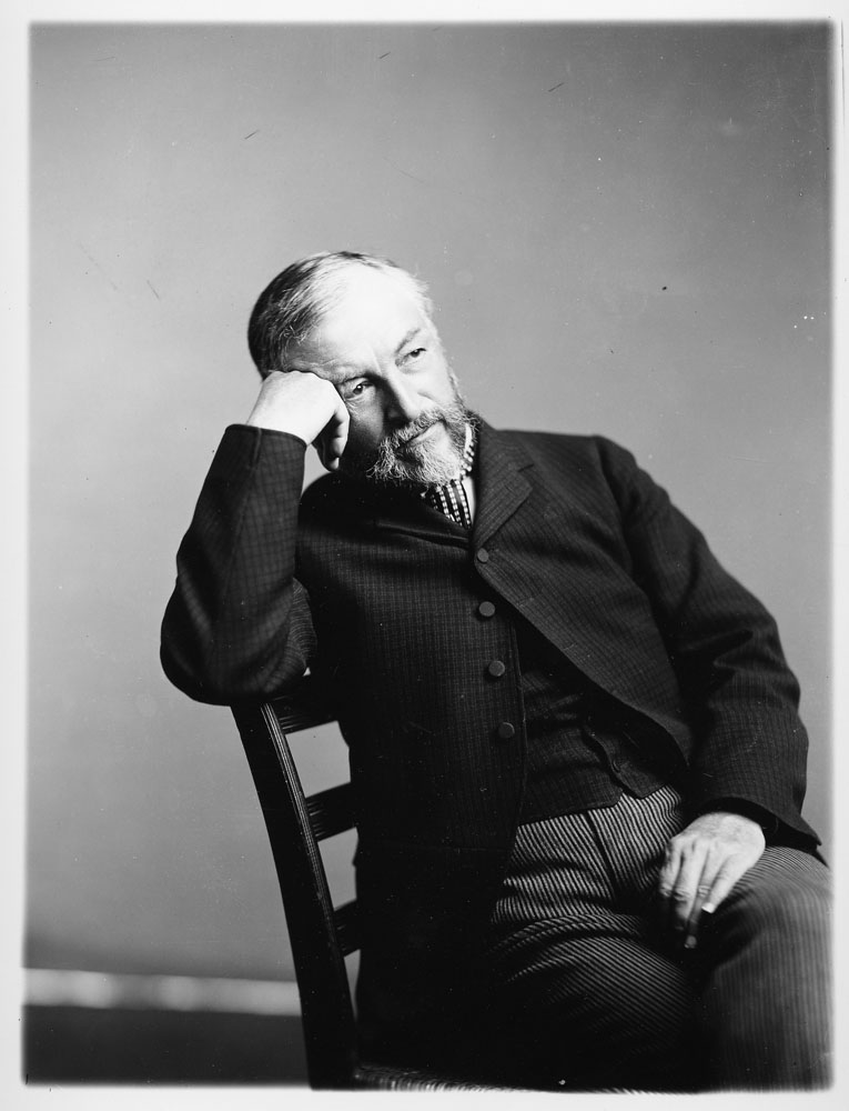 Portrait of Samuel P. Langley sitting in a chair. Smithsonian Institution Archives, Record Unit 95, Box 15, Folder 8, Neg. # 2002-12175.