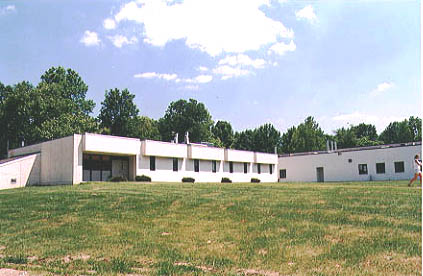 Shot of a large, one-story building.