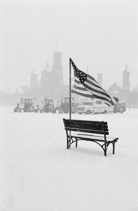Tractors on the National Mall during a snowstorm.