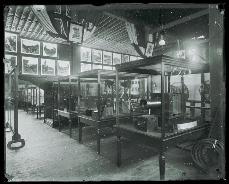 Camera equipment and photographs on exhibit at the 1876 Centennial Exposition.