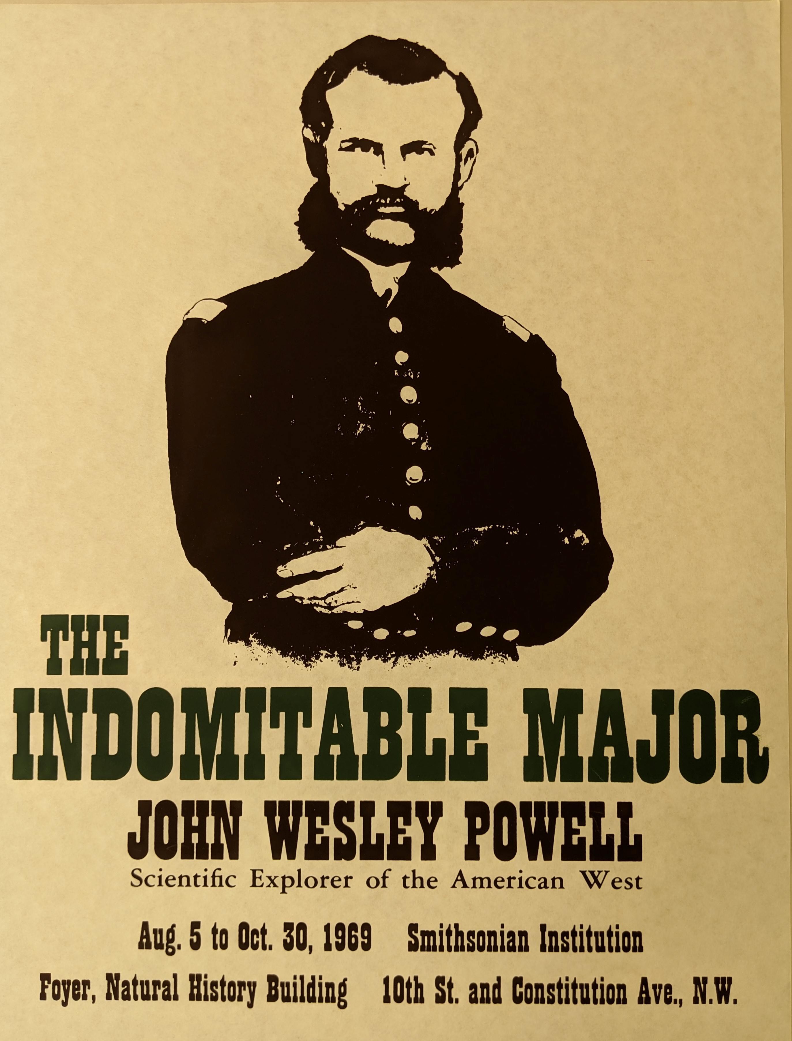 Poster with parchment color background and portrait of John Wesley Powell.