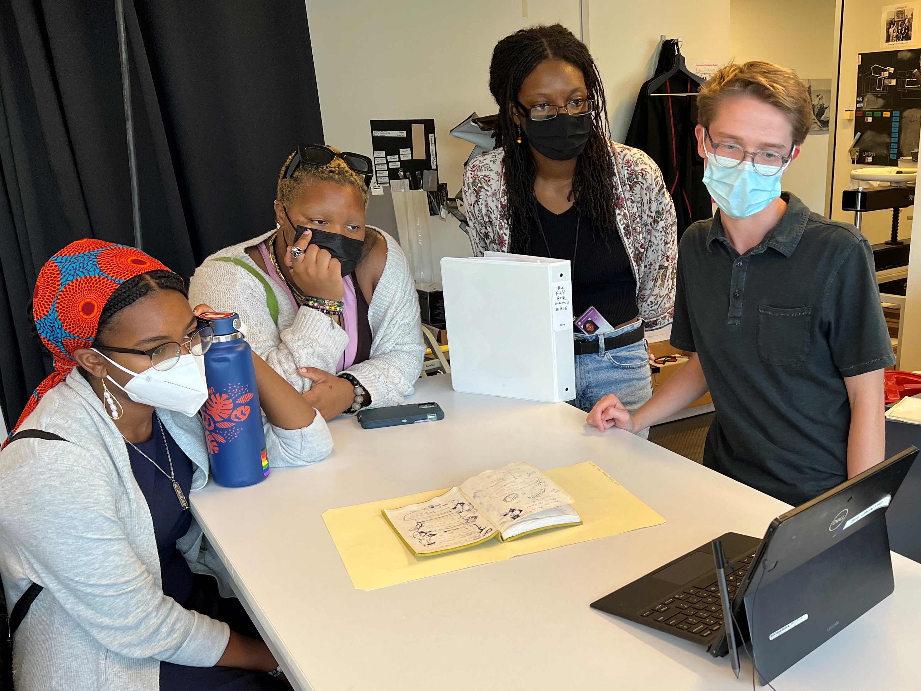 Anailah Funchess, Camilia Bell and Efeh Ibojie (L-R) discuss the treatment plan for SIA Acc. 16-179,