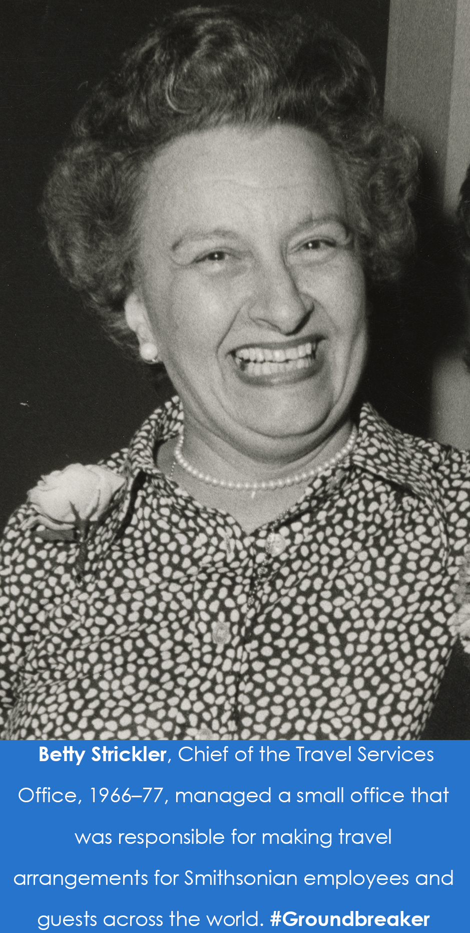 Photograph of a woman smiling broadly. 