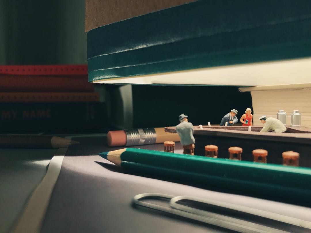 Miniature version of Hopper's Nighthawks with pencils and other office supplies.