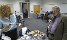 Client with family archives - stereoscopic color slides which delighted our curator. Photo by Nora L