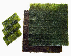 Nori - Roasted sheets of seaweed used in Japanese cuisine for sushi. The smaller ones are already se
