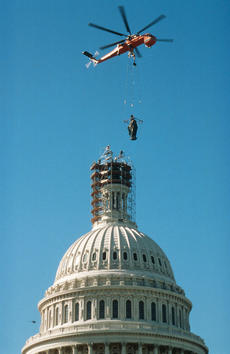 The Statue of Freedom being replaced on top of the U.S. Capitol.