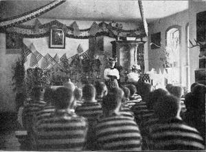 Dr. Slosson lecturing to prisoners at the Laramie Penitentiary.