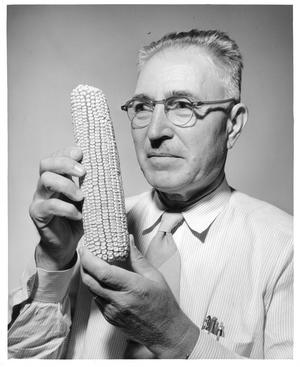 Merle T. Jenkins holding an ear of corn, Smithsonian Institution Archives, Accession 90-105, Neg no.