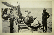 Black and white image of a landing party of men standing and sitting on a small boat that is about t