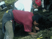 Two researchers work on an excavation 