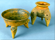 Two ceramic tripod (three-legged) decorated vessels 