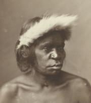 Woman with headdress looking to the side