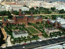 The Smithsonian Institution Building (Castle), view from south; National Museum of Natural History w