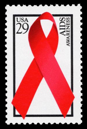 White stamp with red ribbon.