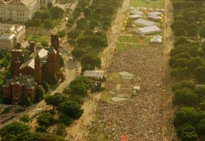 An aerial photograph of the National Mall on August 10, 1996. The Mall is packed with people for the