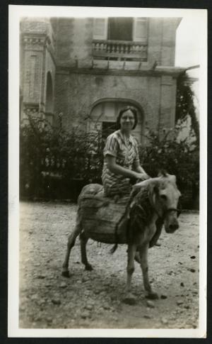 "Ruth, on the sorriest-looking donkey in town. Port-au-Prince, Haiti, August 26, 1935 taken by Richa