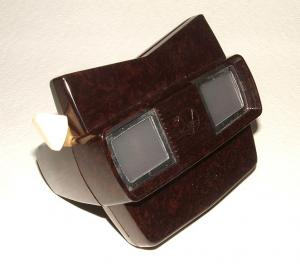 Brown handheld view with two viewing plates.