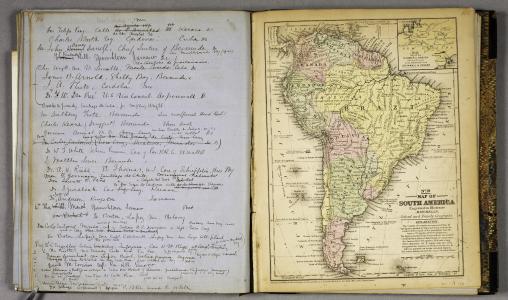 An open book. The left page is handwritten and the right page is a map of South America 