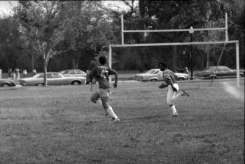 Tommy Brown carries Smithsonian flag football team to victory, 1980.