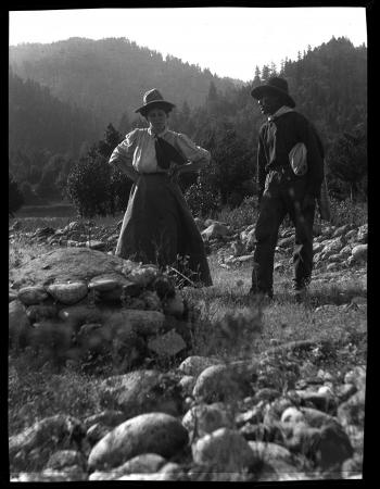 Grace Nicholson with the Karok man that she called Camp Creek George (at Klamath River), Grace Nicho