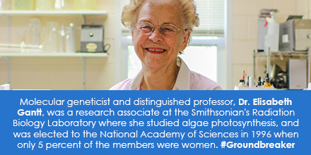 Portrait of elderly woman smiling in lab.