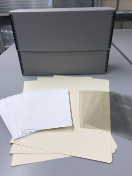 Mylar slips, a manuscript box, folders and other materials used to preserve family photographs and d