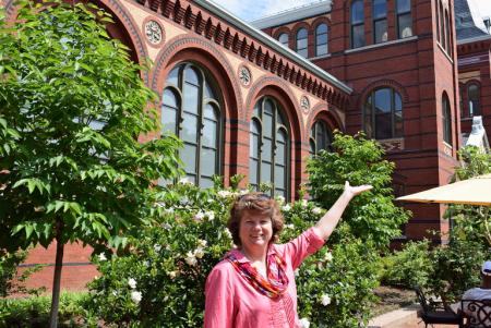 Smithsonian Gardens' Cindy Brown in front of the gardenias at the Enid A. Haupt Garden.