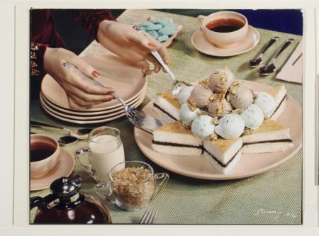 Holiday table with silver utensils and star-shaped cake