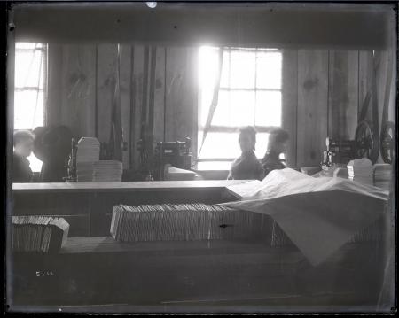 Female Factory Workers Use Machinery with Belt-driven Lathes