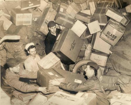 U.S. Troops Surrounded by Holiday Mail During World War II, c. 1944, National Postal Museum, Accessi