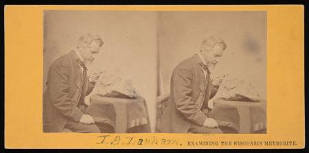 Stereograph of Increase Allen Lapham (1811-1875) examining a fragment of a meteorite found in Trento