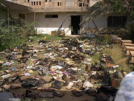 Materials drying outside the Mukhabarat, Saddam Hussein's intelligence headquarters. Courtesy of the