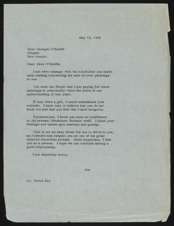 Typewritten letter on blue paper. In the letter, Hirshhorn expresses his unhappiness with the condit