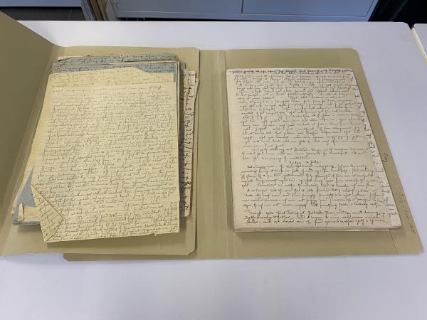 Side-by-side of damaged papers, with folds and tears, and recently treated papers in good conditions