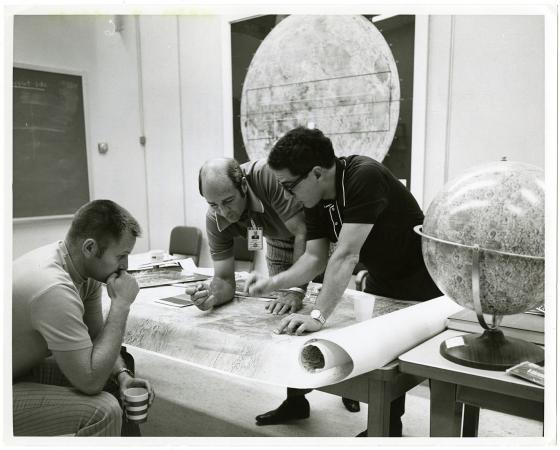 Geologist Farouk El-Baz at NASA teaching astronaut Ronald Evens about the geology of the moon