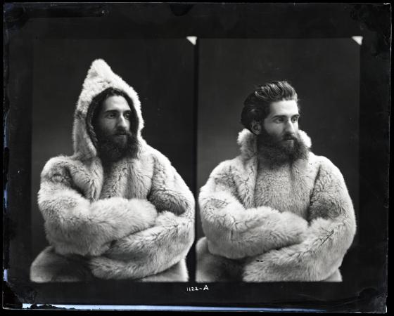 Two photographs of Bessels modeling a fur parka. 