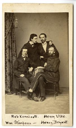 Four young men, members of the Megatherium Club, two seated in the foreground and two standing behin