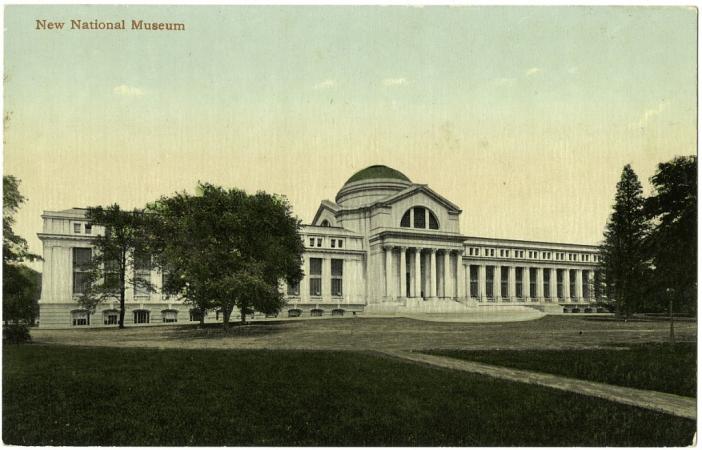 Colored postcard, labeled "New National Museum." It is the Natural History Building with trees in fr