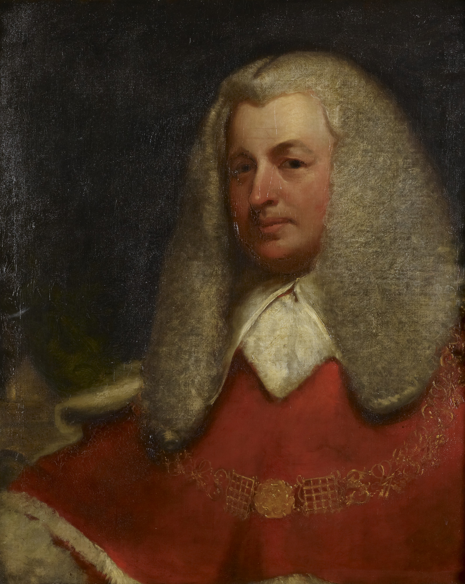 Image of a man in a red robe